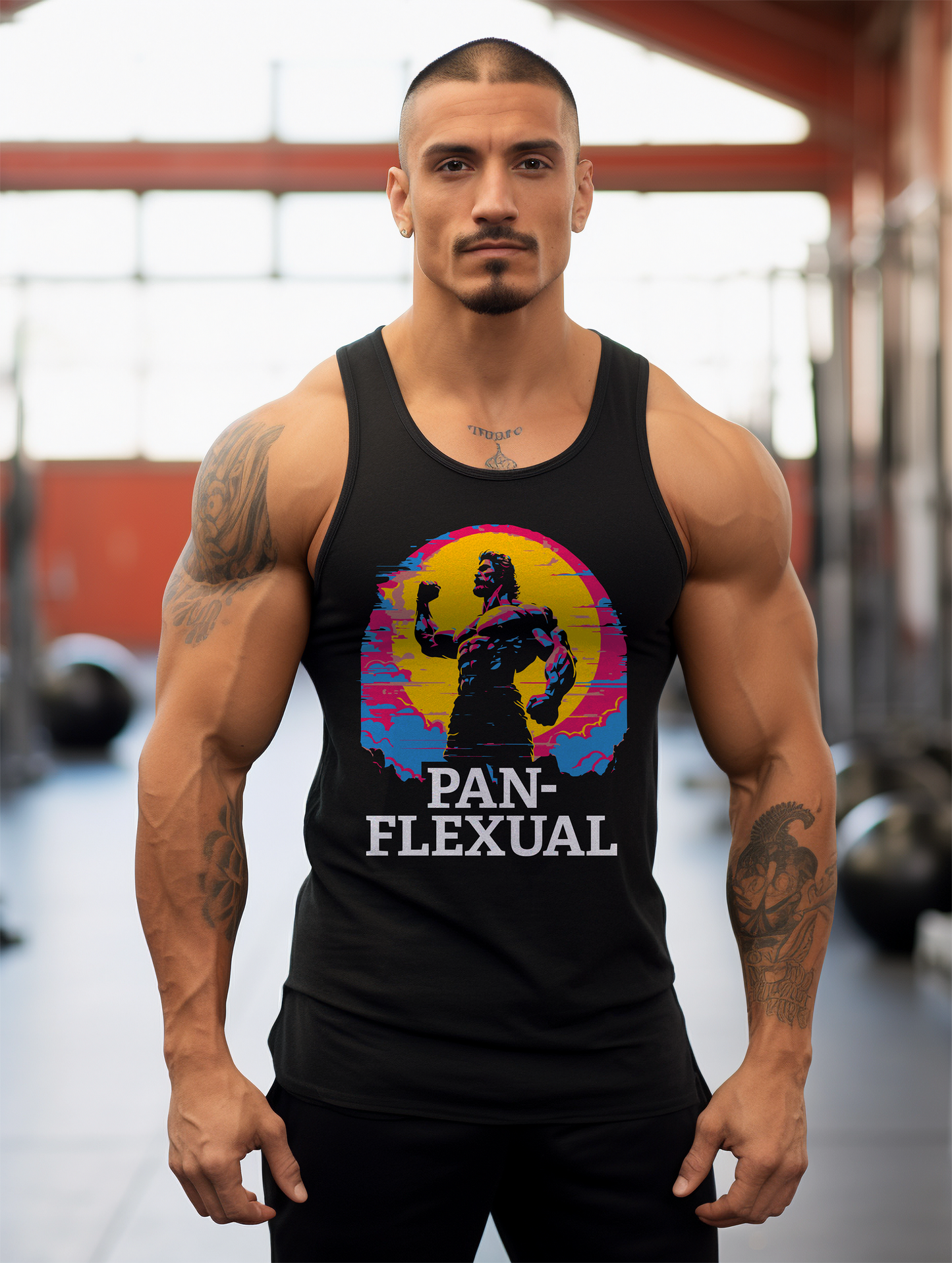Hispanic muslced bodybuilder wearing a black tank top featuring a graphic with a muscled bodybuilder and the phrase "Pan-Flexual" on it.